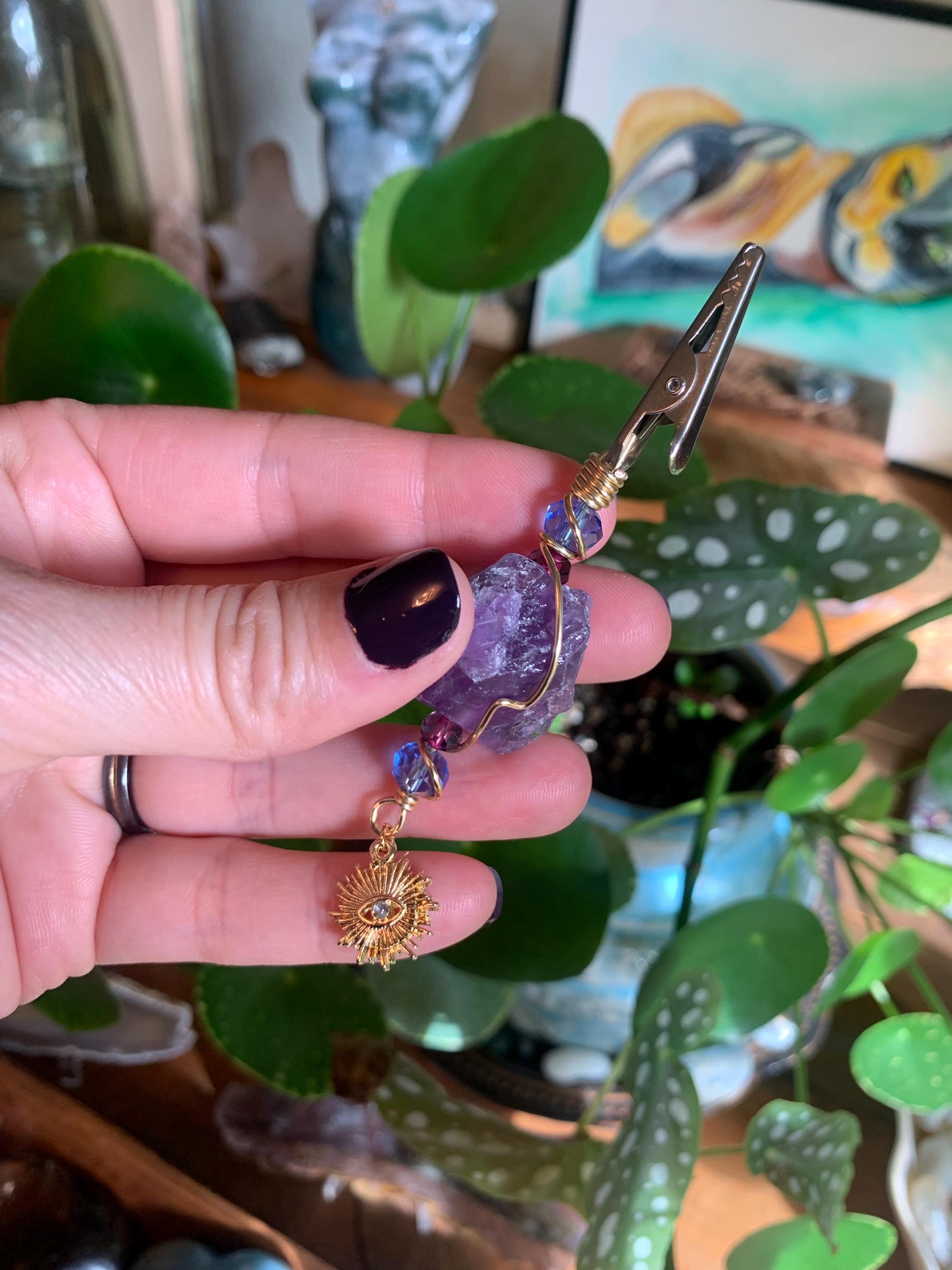 Raw Amethyst Smoke Clip with purple and blue glass beads, gold wire, evil eye, sun charm